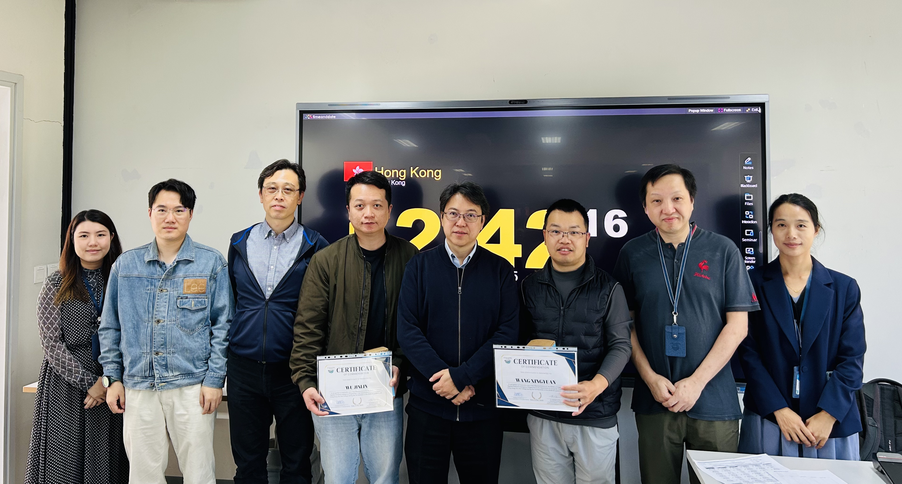 Student receiving Class Leader Certificate from Programme Leader